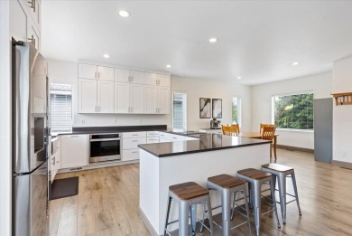 Does year-round deeded beach access with 300 ft of BEACHFRONT on Liberty Lake Golf Club in Washington - for sale on GolfHomes.com, golf home, golf lot