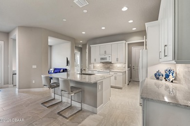 Newly designed Arbor III townhome with a desirable side entrance on Plantation Bay Golf and Country Club in Florida - for sale on GolfHomes.com, golf home, golf lot