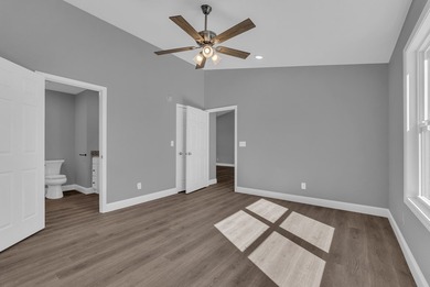 Experience modern comfort and a true lakeside lifestyle in this on Lake Tansi Village Country Club in Tennessee - for sale on GolfHomes.com, golf home, golf lot