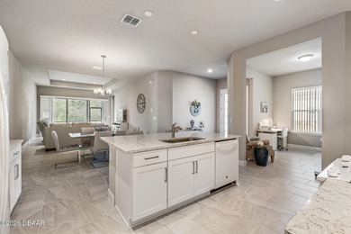 Newly designed Arbor III townhome with a desirable side entrance on Plantation Bay Golf and Country Club in Florida - for sale on GolfHomes.com, golf home, golf lot