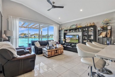 This spacious 1-story home offers serene water views from nearly on Woodmont Country Club in Florida - for sale on GolfHomes.com, golf home, golf lot