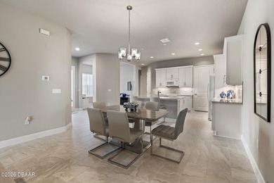 Newly designed Arbor III townhome with a desirable side entrance on Plantation Bay Golf and Country Club in Florida - for sale on GolfHomes.com, golf home, golf lot