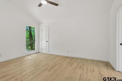 Welcome to this charming 2-bedroom, 2-bathroom home nestled in on Hide-A-Way Lake Golf Course in Texas - for sale on GolfHomes.com, golf home, golf lot