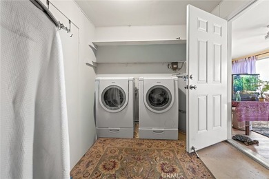 Located in the desirable 55+ community, this single-story home on Cherry Hills Golf Club in California - for sale on GolfHomes.com, golf home, golf lot