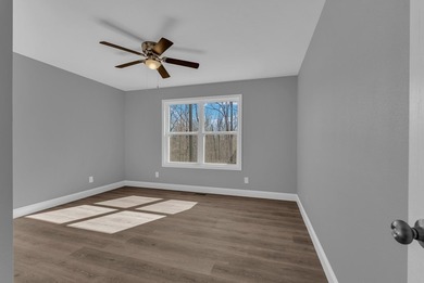 Experience modern comfort and a true lakeside lifestyle in this on Lake Tansi Village Country Club in Tennessee - for sale on GolfHomes.com, golf home, golf lot