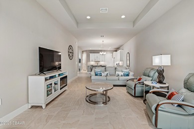Newly designed Arbor III townhome with a desirable side entrance on Plantation Bay Golf and Country Club in Florida - for sale on GolfHomes.com, golf home, golf lot