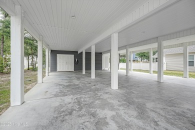 Tesla Charging Station Already Installed! Fully Furnished Beach on Founders Club At St. James Plantation in North Carolina - for sale on GolfHomes.com, golf home, golf lot