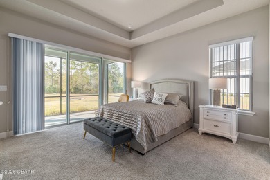 Newly designed Arbor III townhome with a desirable side entrance on Plantation Bay Golf and Country Club in Florida - for sale on GolfHomes.com, golf home, golf lot