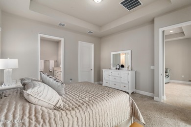 Newly designed Arbor III townhome with a desirable side entrance on Plantation Bay Golf and Country Club in Florida - for sale on GolfHomes.com, golf home, golf lot