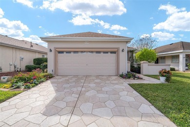 Welcome to the Kingston Patio Model - Well cared for 2 Bedrooms on Eagle Ridge At Spruce Creek Country Club in Florida - for sale on GolfHomes.com, golf home, golf lot