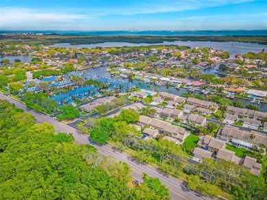 FLOODED DURING HELENE! BEING SOLD AS-IS FOR BIG DISCOUNT! THIS on Mangrove Bay Golf Course in Florida - for sale on GolfHomes.com, golf home, golf lot