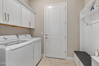 Newly designed Arbor III townhome with a desirable side entrance on Plantation Bay Golf and Country Club in Florida - for sale on GolfHomes.com, golf home, golf lot