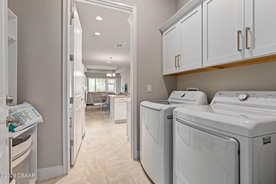 Newly designed Arbor III townhome with a desirable side entrance on Plantation Bay Golf and Country Club in Florida - for sale on GolfHomes.com, golf home, golf lot