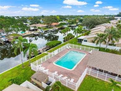 FLOODED DURING HELENE! BEING SOLD AS-IS FOR BIG DISCOUNT! THIS on Mangrove Bay Golf Course in Florida - for sale on GolfHomes.com, golf home, golf lot