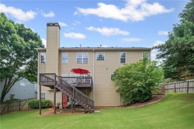 CUSTOM MODEL HOME with RICH UPGRADES and NEW FLOORING AND on Sugar Hill Golf Club in Georgia - for sale on GolfHomes.com, golf home, golf lot