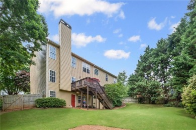 CUSTOM MODEL HOME with RICH UPGRADES and NEW FLOORING AND on Sugar Hill Golf Club in Georgia - for sale on GolfHomes.com, golf home, golf lot