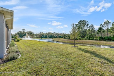 Newly designed Arbor III townhome with a desirable side entrance on Plantation Bay Golf and Country Club in Florida - for sale on GolfHomes.com, golf home, golf lot