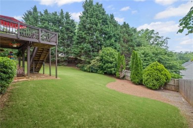 CUSTOM MODEL HOME with RICH UPGRADES and NEW FLOORING AND on Sugar Hill Golf Club in Georgia - for sale on GolfHomes.com, golf home, golf lot