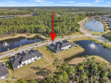 Newly designed Arbor III townhome with a desirable side entrance on Plantation Bay Golf and Country Club in Florida - for sale on GolfHomes.com, golf home, golf lot