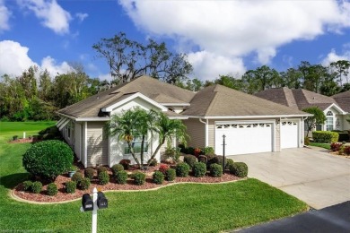 This *LARGER THAN IT LOOKS* 3 bedroom, 2.5 bath, oversized 2-car on  in Florida - for sale on GolfHomes.com, golf home, golf lot