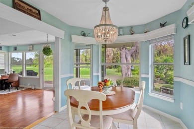 This *LARGER THAN IT LOOKS* 3 bedroom, 2.5 bath, oversized 2-car on  in Florida - for sale on GolfHomes.com, golf home, golf lot