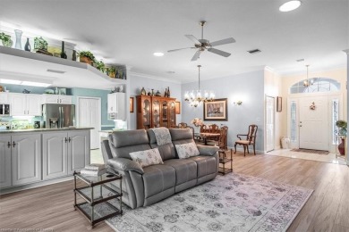 This *LARGER THAN IT LOOKS* 3 bedroom, 2.5 bath, oversized 2-car on  in Florida - for sale on GolfHomes.com, golf home, golf lot
