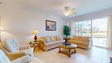 Enjoy breathtaking WATER AND CANAL VIEWS from the comfort of on Saint Andrews South Golf Club in Florida - for sale on GolfHomes.com, golf home, golf lot