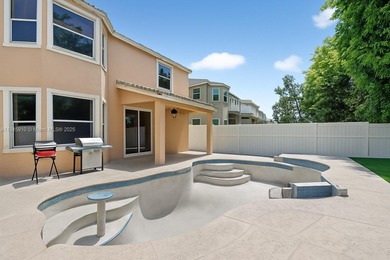 Spacious 5BR, 2.5BA home in Madison Green, Royal Palm Beach on The Links At Madison Green in Florida - for sale on GolfHomes.com, golf home, golf lot