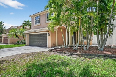Spacious 5BR, 2.5BA home in Madison Green, Royal Palm Beach on The Links At Madison Green in Florida - for sale on GolfHomes.com, golf home, golf lot