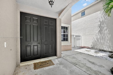 Spacious 5BR, 2.5BA home in Madison Green, Royal Palm Beach on The Links At Madison Green in Florida - for sale on GolfHomes.com, golf home, golf lot