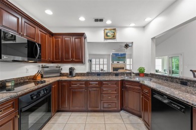 Elegant Mediterranean Sanctuary in Clearwater's Prestigious on Feather Sound Country Club in Florida - for sale on GolfHomes.com, golf home, golf lot