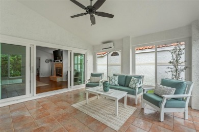 Elegant Mediterranean Sanctuary in Clearwater's Prestigious on Feather Sound Country Club in Florida - for sale on GolfHomes.com, golf home, golf lot