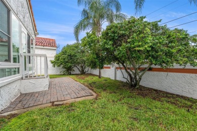 Elegant Mediterranean Sanctuary in Clearwater's Prestigious on Feather Sound Country Club in Florida - for sale on GolfHomes.com, golf home, golf lot