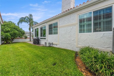 Elegant Mediterranean Sanctuary in Clearwater's Prestigious on Feather Sound Country Club in Florida - for sale on GolfHomes.com, golf home, golf lot
