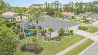 Nestled within the guard-gated Spruce Creek Fly-In community on Spruce Creek Golf Club in Florida - for sale on GolfHomes.com, golf home, golf lot