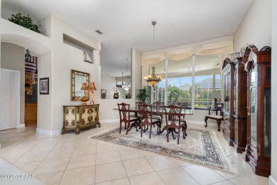 Nestled within the guard-gated Spruce Creek Fly-In community on Spruce Creek Golf Club in Florida - for sale on GolfHomes.com, golf home, golf lot