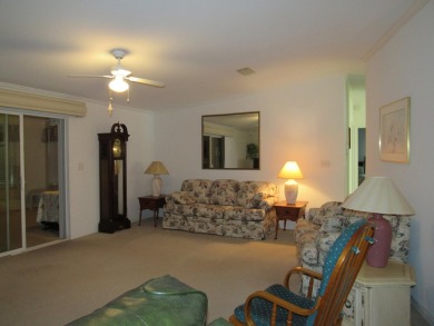 2005 Palm Harbor mobile home with a large (12x20) Florida room on Spanish Lakes Golf Village in Florida - for sale on GolfHomes.com, golf home, golf lot