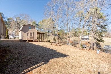 Waterfront living conveniently located near town! A home with a on Piney Point Golf Club in North Carolina - for sale on GolfHomes.com, golf home, golf lot