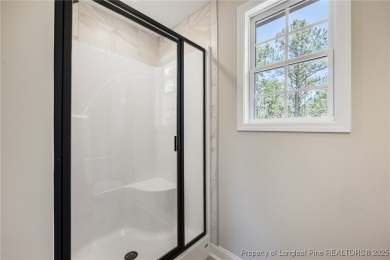 Discover your dream home where elegance meets functionality in a on Deercroft Golf and Country Club in North Carolina - for sale on GolfHomes.com, golf home, golf lot