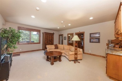 This classic mountain home is set low off Highlands Drive on Breckenridge Golf Club in Colorado - for sale on GolfHomes.com, golf home, golf lot