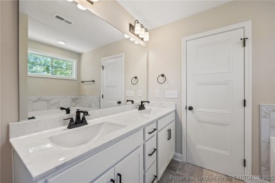 Discover your dream home where elegance meets functionality in a on Deercroft Golf and Country Club in North Carolina - for sale on GolfHomes.com, golf home, golf lot