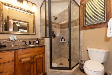 This classic mountain home is set low off Highlands Drive on Breckenridge Golf Club in Colorado - for sale on GolfHomes.com, golf home, golf lot
