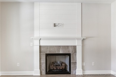 Discover your dream home where elegance meets functionality in a on Deercroft Golf and Country Club in North Carolina - for sale on GolfHomes.com, golf home, golf lot