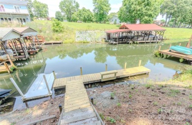 Waterfront living conveniently located near town! A home with a on Piney Point Golf Club in North Carolina - for sale on GolfHomes.com, golf home, golf lot
