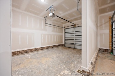 Discover your dream home where elegance meets functionality in a on Deercroft Golf and Country Club in North Carolina - for sale on GolfHomes.com, golf home, golf lot