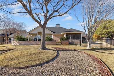 Welcome to your dream home located in the prestigious, gated on Pecan Plantation Country Club in Texas - for sale on GolfHomes.com, golf home, golf lot