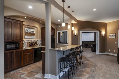 Experience exceptional views overlooking the 3rd fairway of The on The Legend At Bergamont in Wisconsin - for sale on GolfHomes.com, golf home, golf lot