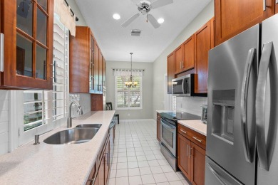 Luxurious Lakefront Living in The Meadows of Palm City! Enjoy on Monarch Country Club in Florida - for sale on GolfHomes.com, golf home, golf lot