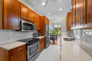 Luxurious Lakefront Living in The Meadows of Palm City! Enjoy on Monarch Country Club in Florida - for sale on GolfHomes.com, golf home, golf lot