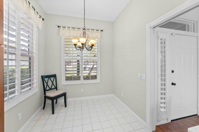 Luxurious Lakefront Living in The Meadows of Palm City! Enjoy on Monarch Country Club in Florida - for sale on GolfHomes.com, golf home, golf lot